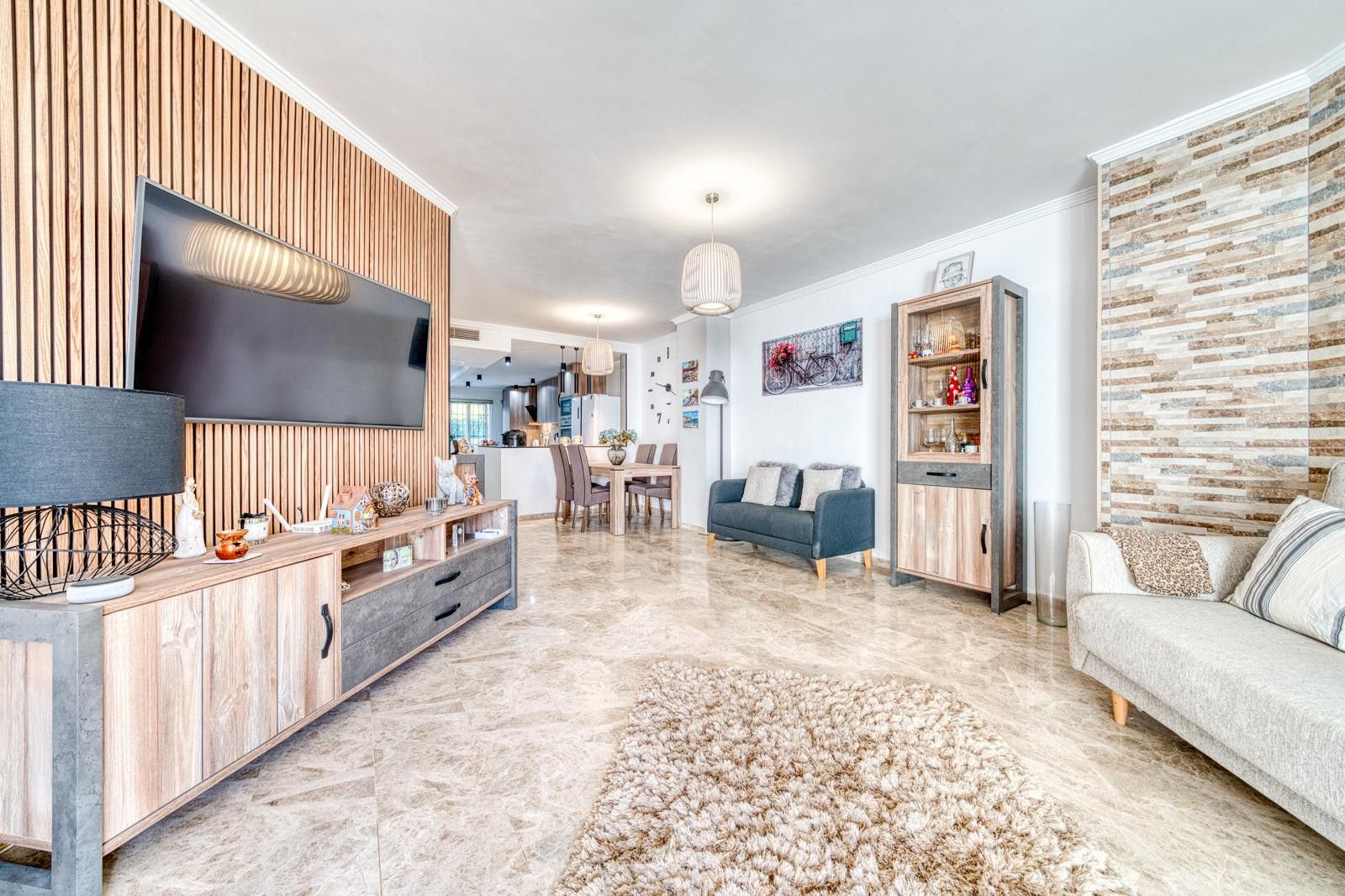 Living room of Planta baja for sale in Mijas  with Air Conditioner, Terrace and Swimming Pool