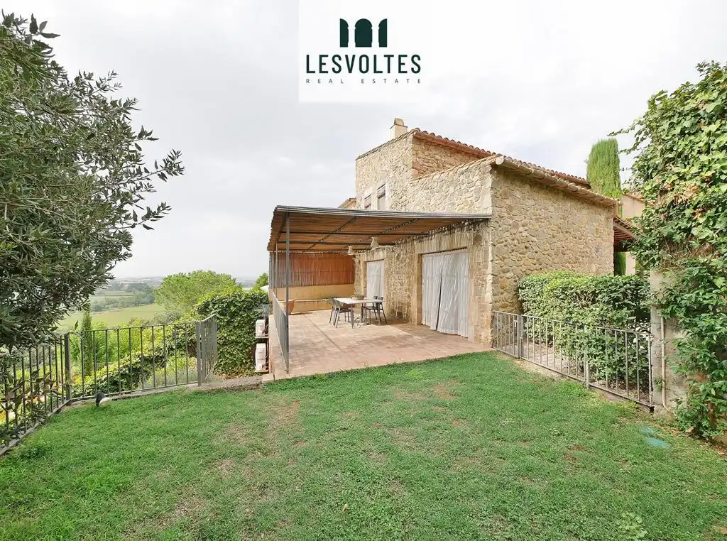 Vista exterior de Finca rústica en venda en La Bisbal d'Empordà amb Aire condicionat, Calefacció i Jardí privat