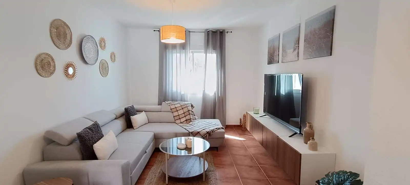 Sala de estar de Apartamento para compartir en Fuente de Piedra con Aire acondicionado, Terraza y Amueblado