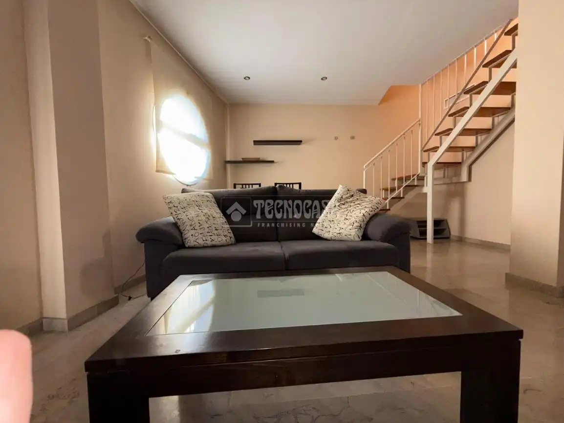 Sala de estar de Ático en venta en La Algaba con Aire acondicionado y Terraza