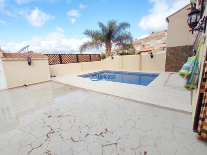 Swimming pool of Single-family semi-detached for sale in Málaga Capital  with Air Conditioner, Terrace and Swimming Pool