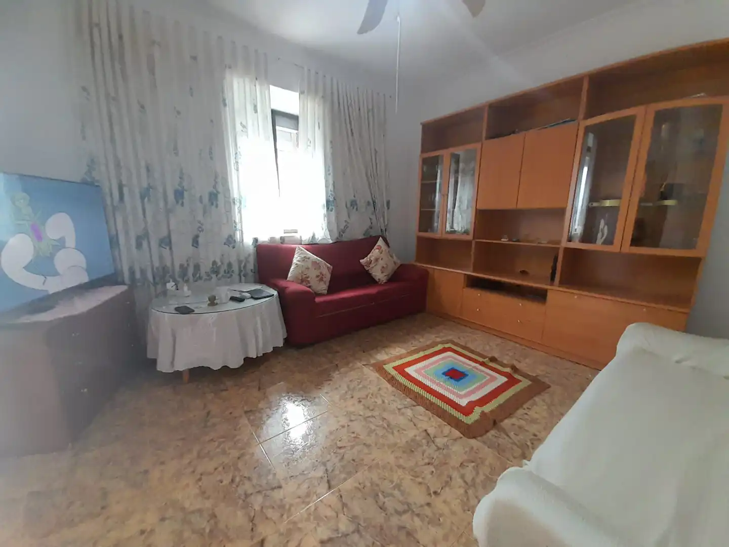 Sala d'estar de Casa adosada en venda en Puertollano amb Aire condicionat i Traster