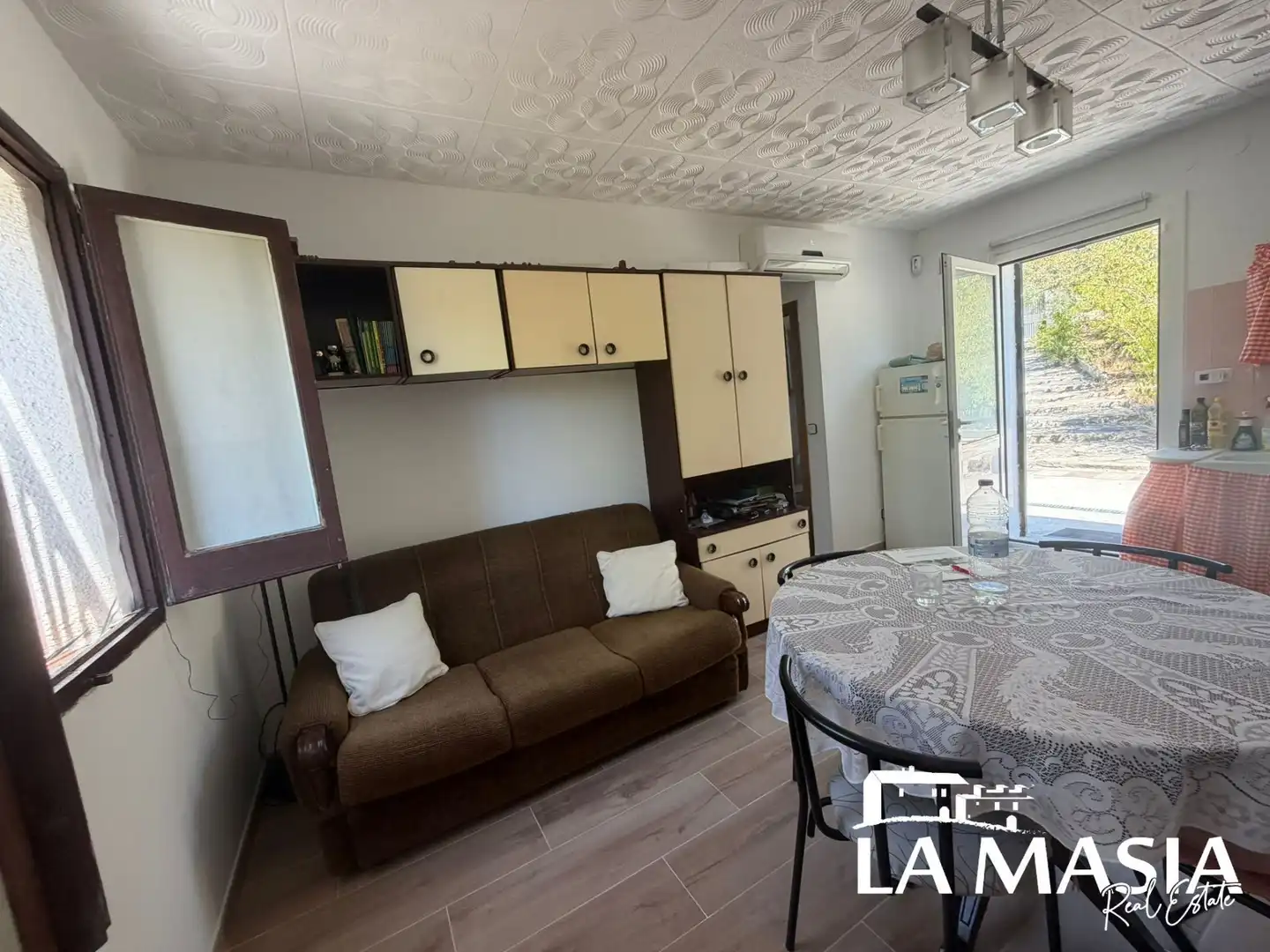 Sala d'estar de Casa o xalet en venda en Olivella amb Aire condicionat i Jardí privat