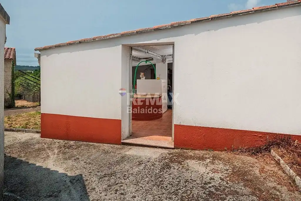 Vista exterior de Casa o xalet en venda en A Pobra do Caramiñal amb Calefacció, Jardí privat i Parquet