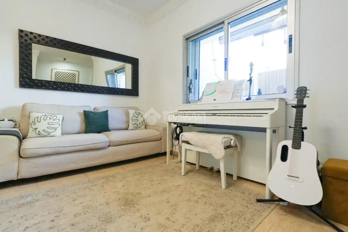 Sala de estar de Casa adosada en venta en Granadilla de Abona