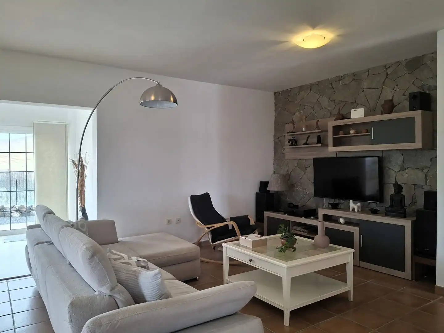 Sala d'estar de Casa o xalet en venda en La Oliva amb Aire condicionat, Jardí privat i Terrassa
