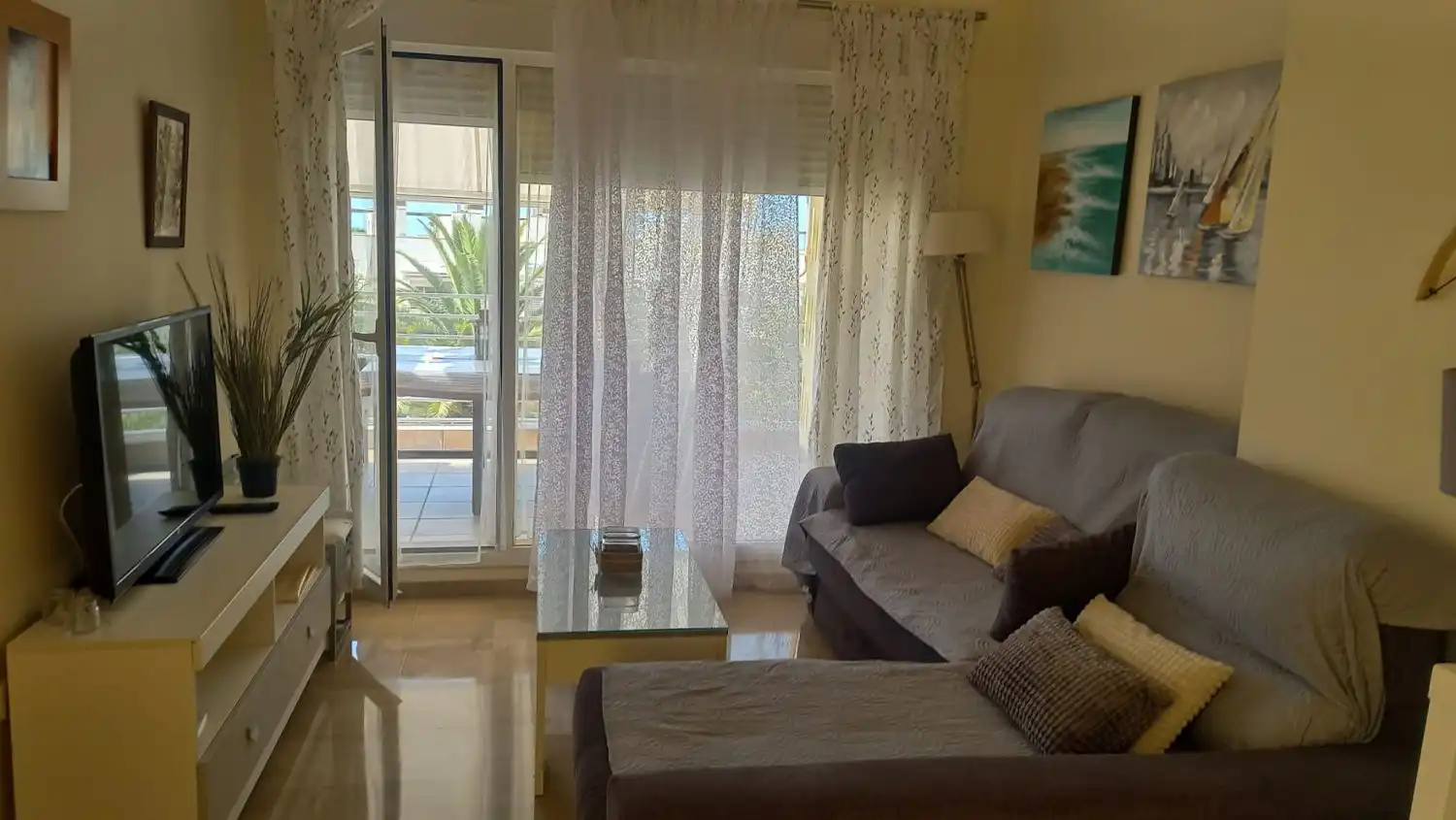 Sala de estar de Piso de alquiler en Isla Cristina con Aire acondicionado, Terraza y Amueblado