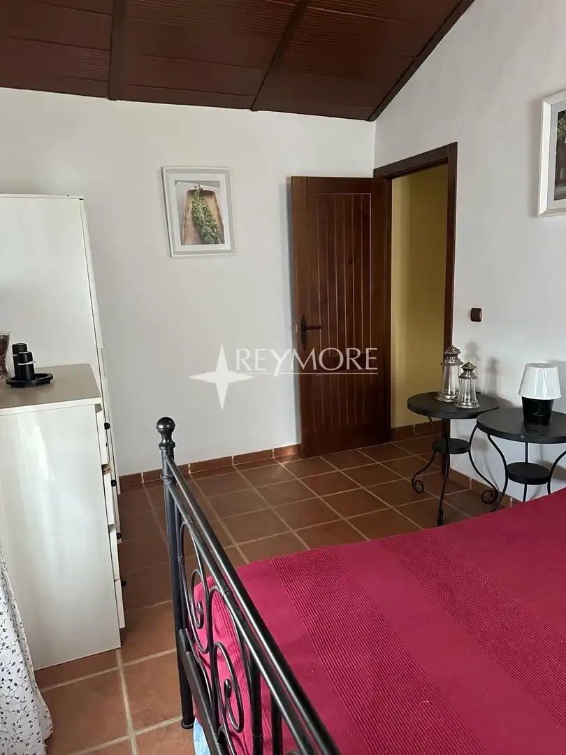 Habitación de Finca rústica en venta en La Puebla de los Infantes con Aire acondicionado, Calefacción y Jardín privado