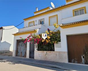 Exterior view of Single-family semi-detached for sale in Aguadulce (Sevilla)  with Air Conditioner and Community pool