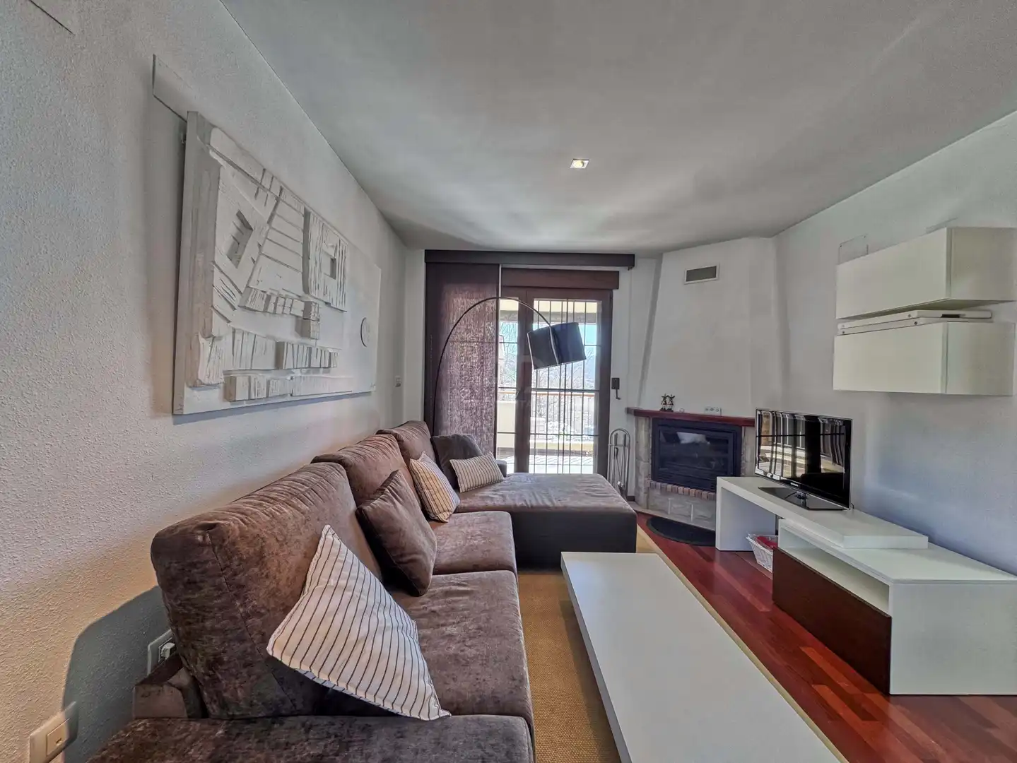 Sala de estar de Dúplex en venta en Alcalá de la Selva con Calefacción y Terraza