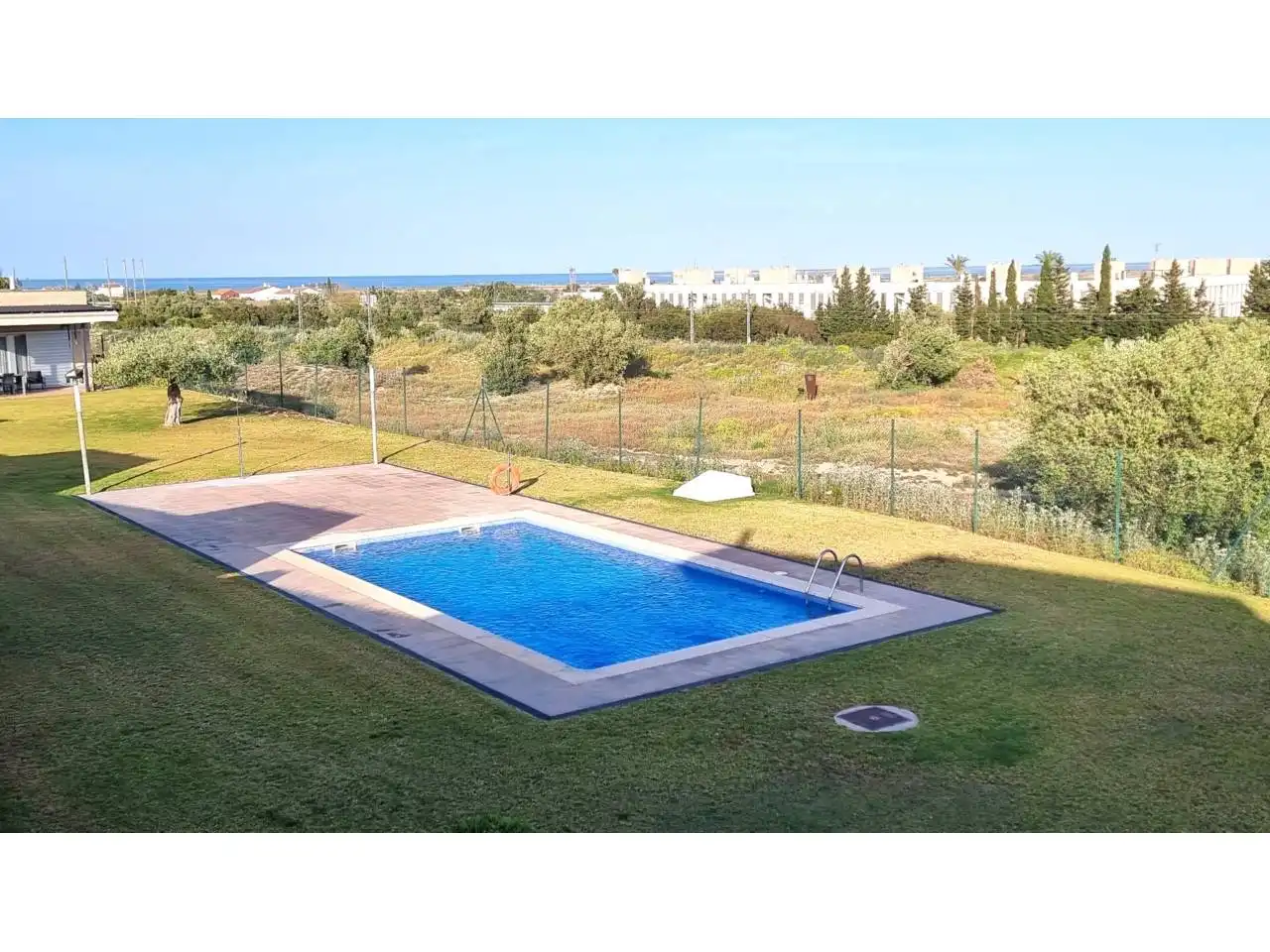 Swimming pool of Flat for sale in L'Ampolla  with Air Conditioner, Heating and Balcony