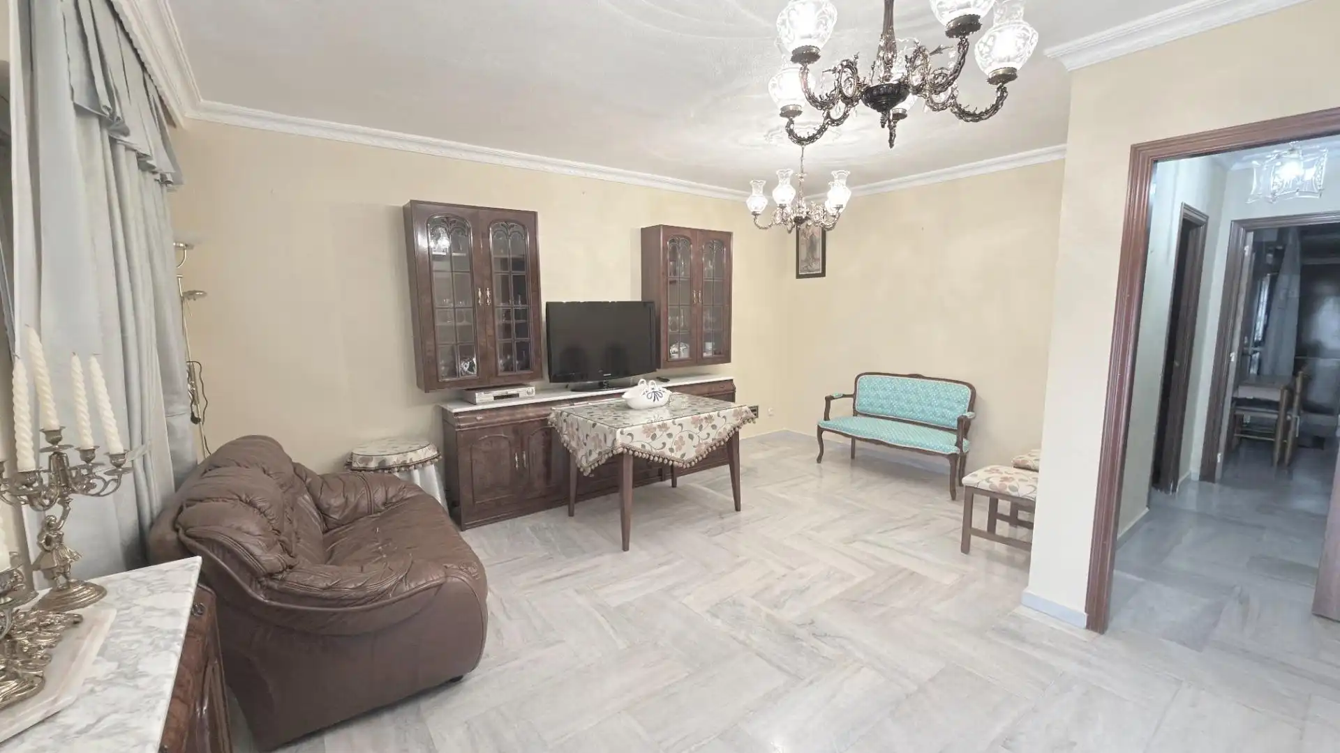 Sala de estar de Casa adosada en venta en Moguer con Terraza