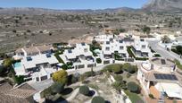 Vista exterior de Casa o xalet en venda en Busot amb Aire condicionat, Terrassa i Piscina