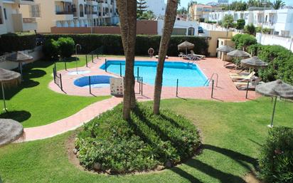 Swimming pool of Apartment for sale in Roquetas de Mar  with Air Conditioner, Private garden and Terrace