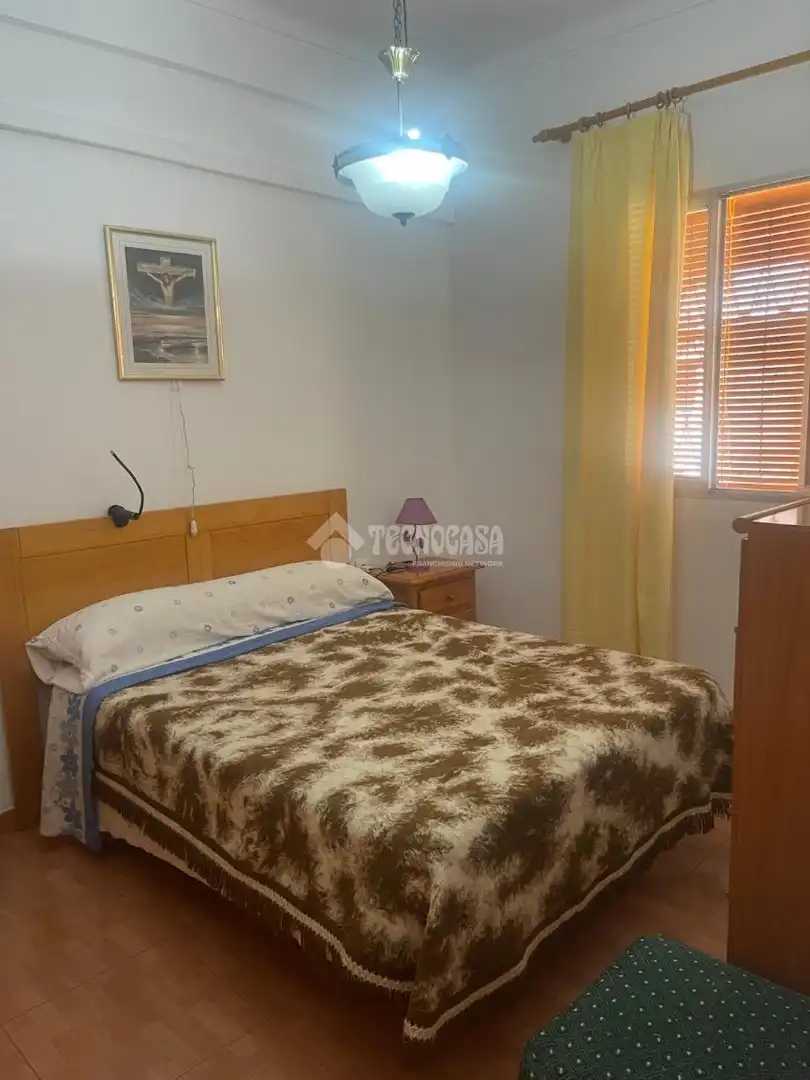 Dormitori de Casa adosada en venda en Sevilla amb Aire condicionat