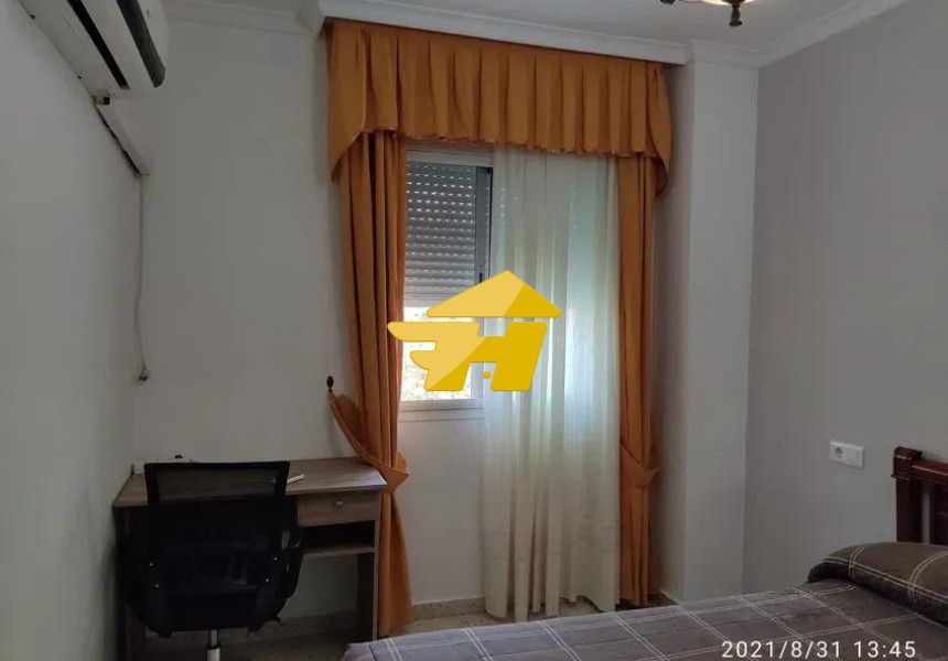 Dormitori de Pis de lloguer en Málaga Capital amb Aire condicionat, Jardí privat i Piscina