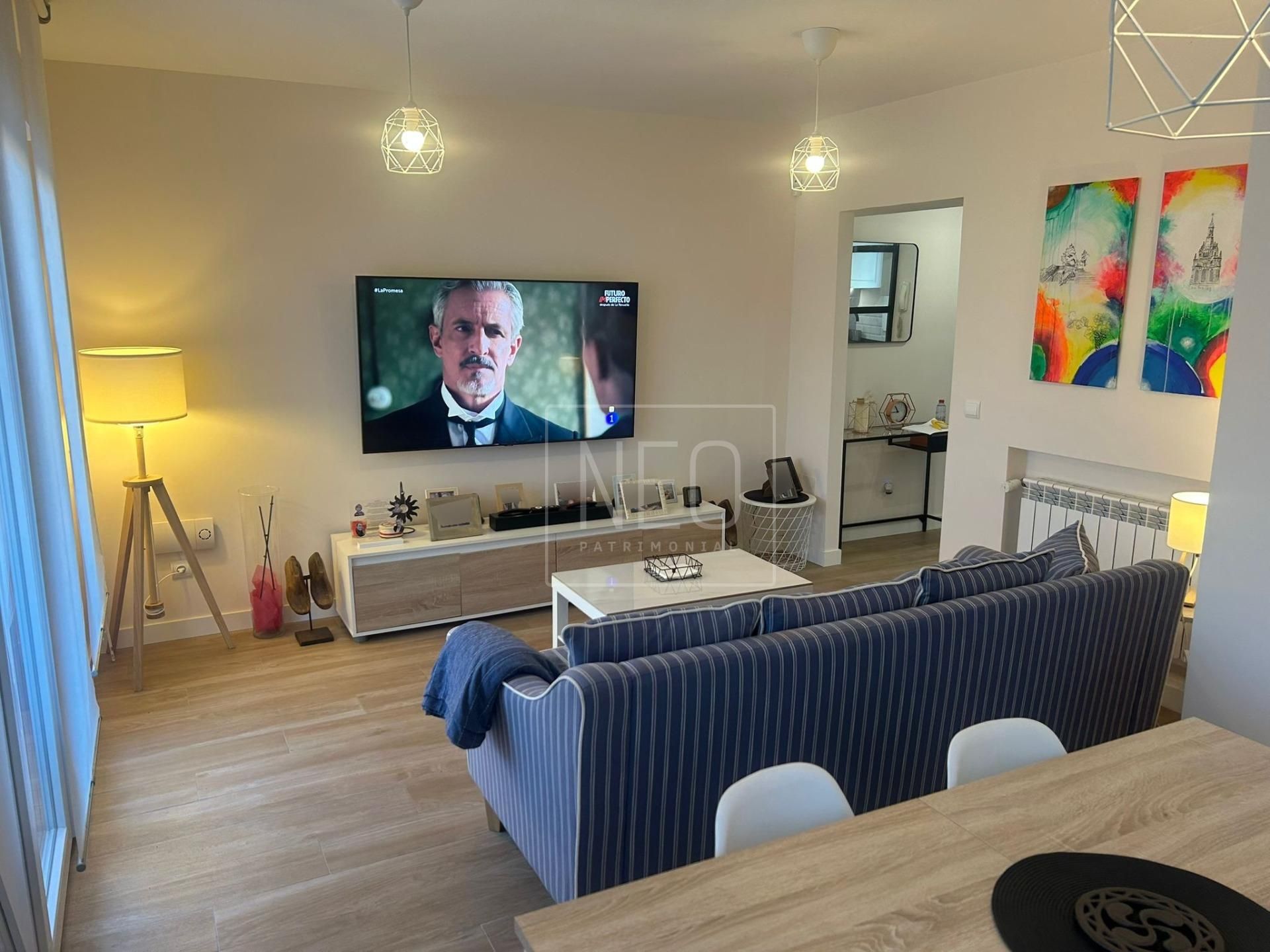 Sala d'estar de Pis en venda en  Madrid Capital amb Calefacció i Terrassa