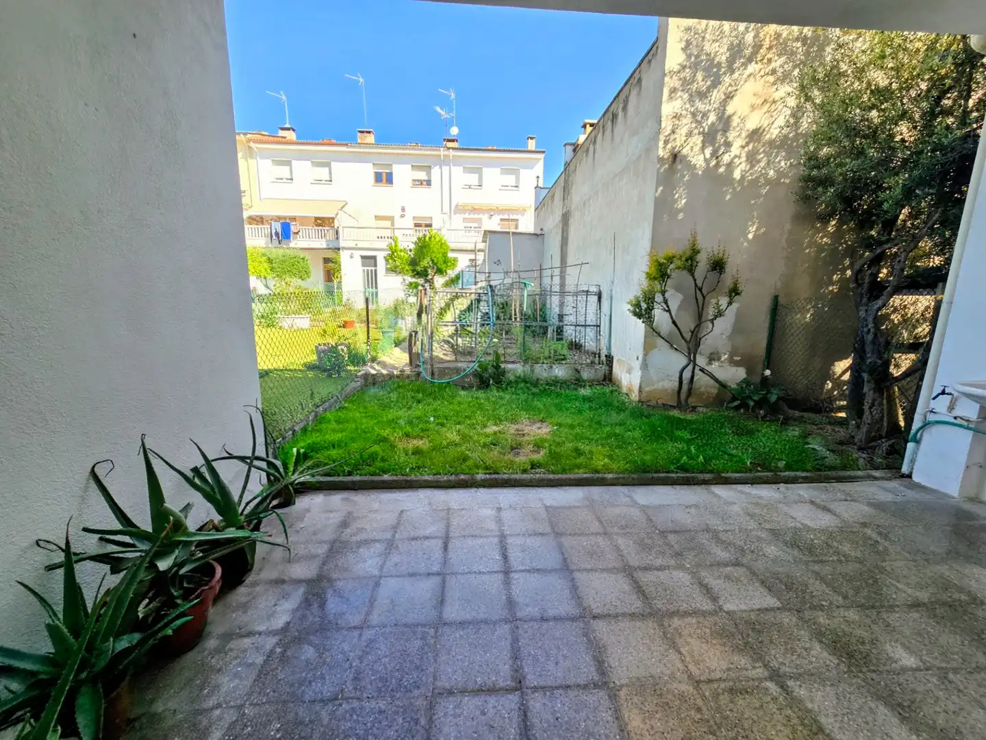 Garten von Einfamilien-Reihenhaus zum Verkauf in Manlleu mit Heizung, Privatgarten und Terrasse