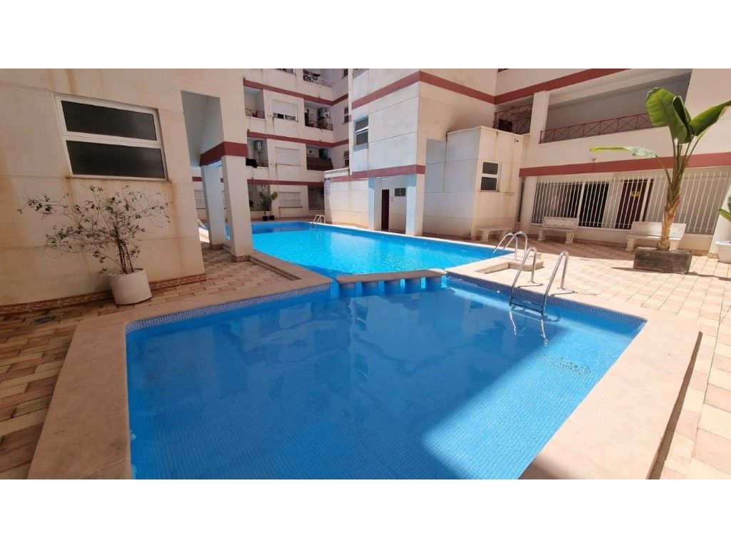 Swimming pool of Apartment for sale in Torrevieja  with Air Conditioner, Swimming Pool and Furnished