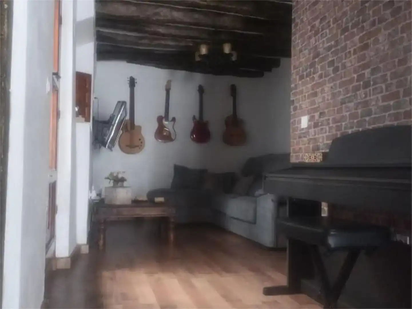 Sala d'estar de Casa adosada de lloguer en Cómpeta amb Jardí privat, Parquet i Traster
