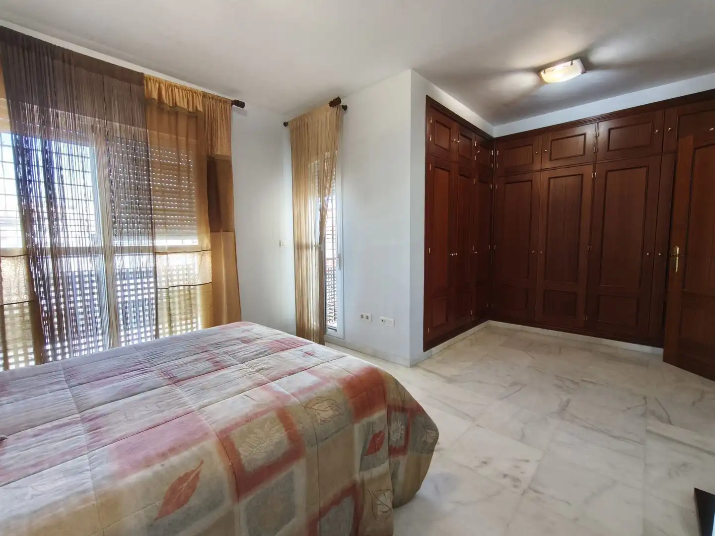 Habitación de Casa adosada en venta en Huelva con Aire acondicionado, Calefacción y Jardín privado