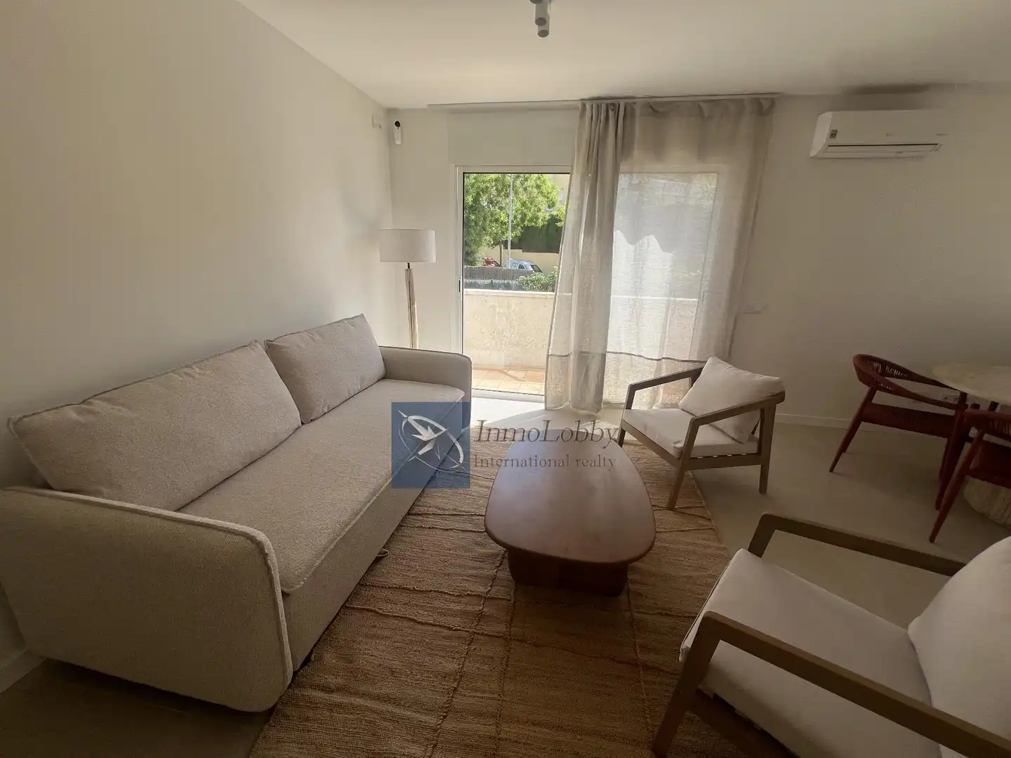 Sala d'estar de Apartament de lloguer en Castell d'Aro, Platja d'Aro i s'Agaró amb Aire condicionat, Terrassa i Piscina comunitària