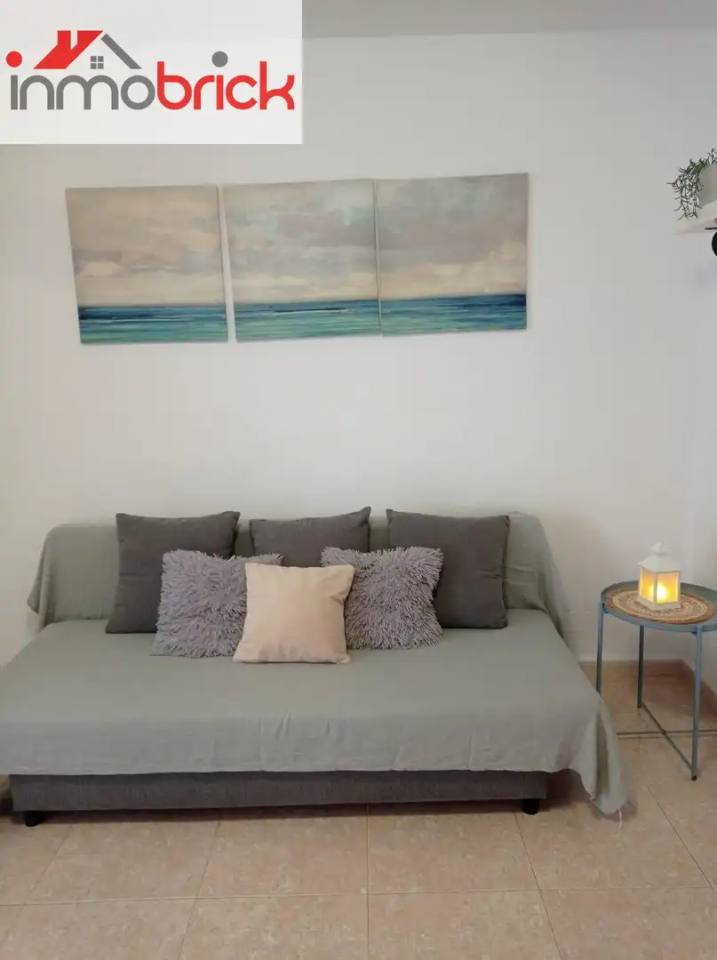 Sala de estar de Piso de alquiler en Benalmádena con Piscina comunitaria