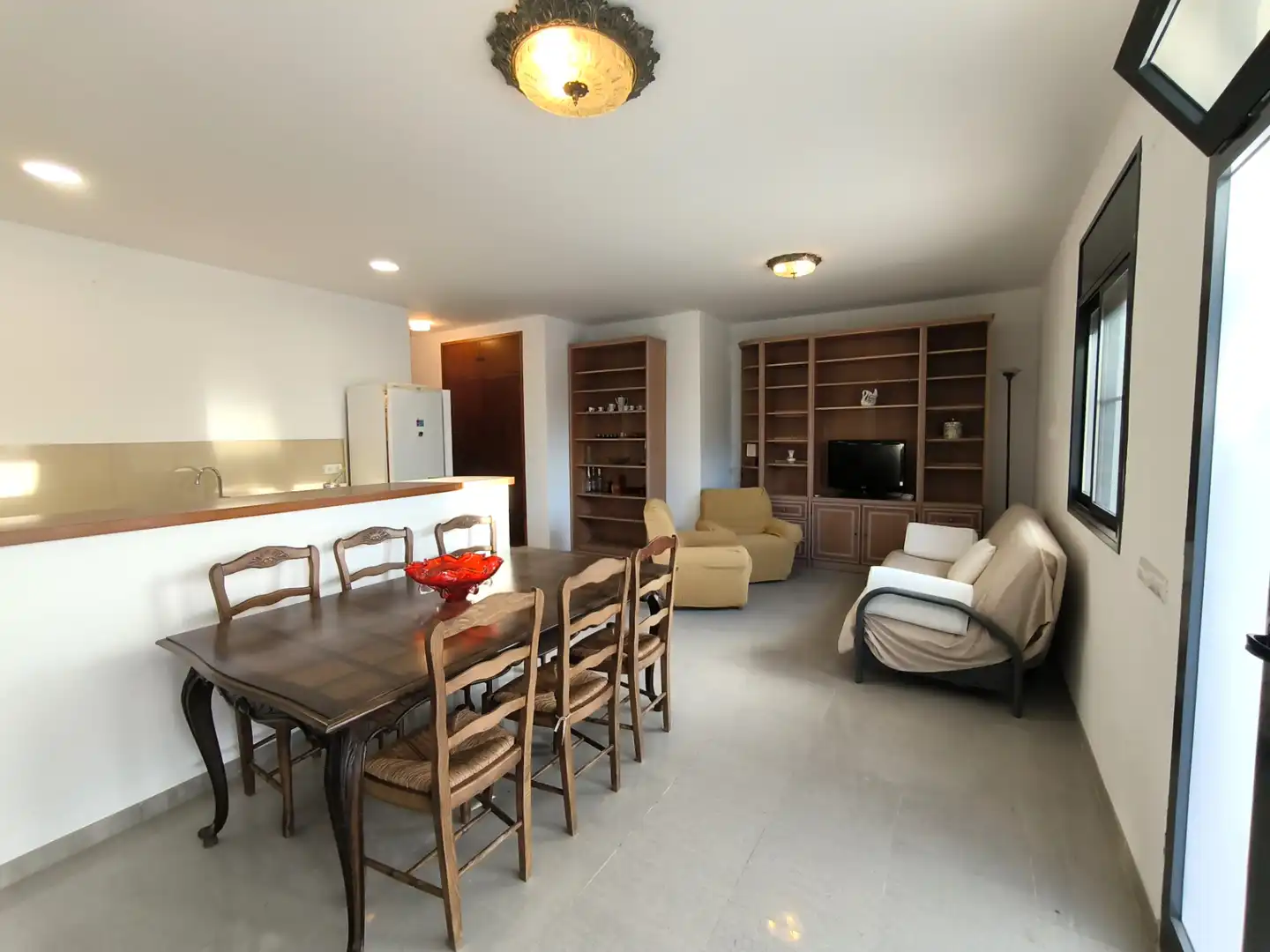Sala d'estar de Apartament en venda en Alcanar amb Aire condicionat, Jardí privat i Terrassa