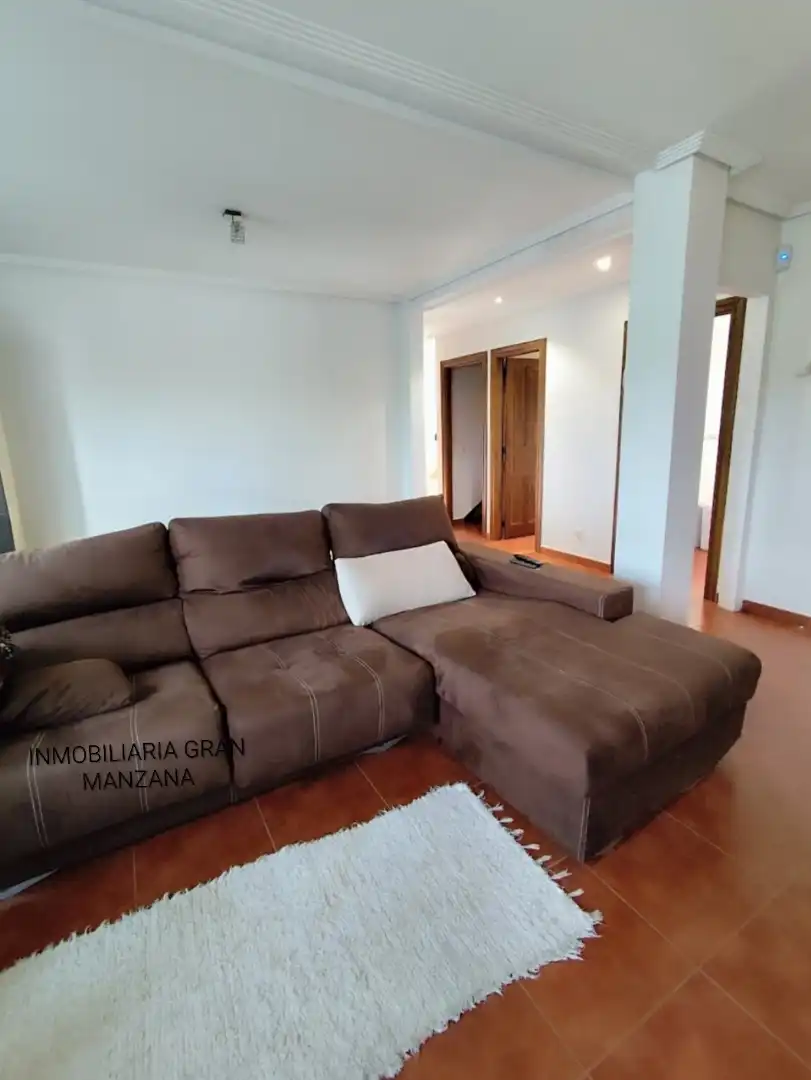 Sala de estar de Casa adosada en venta en Las Quintanillas con Calefacción, Jardín privado y Parquet
