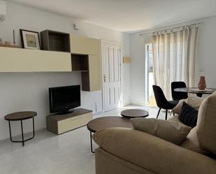 Sala d'estar de Casa adosada en venda en Orihuela amb Aire condicionat, Terrassa i Piscina