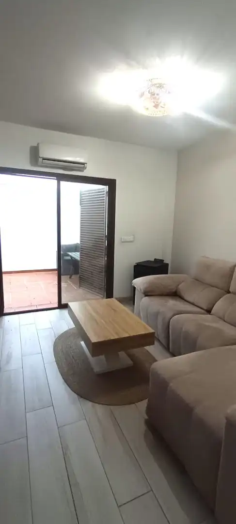 Sala de estar de Casa o chalet en venta en Guillena con Aire acondicionado y Amueblado