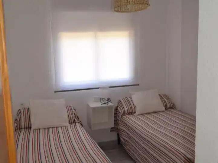Schlafzimmer von Wohnung zur Miete in Benalmádena mit Klimaanlage und Schwimmbad