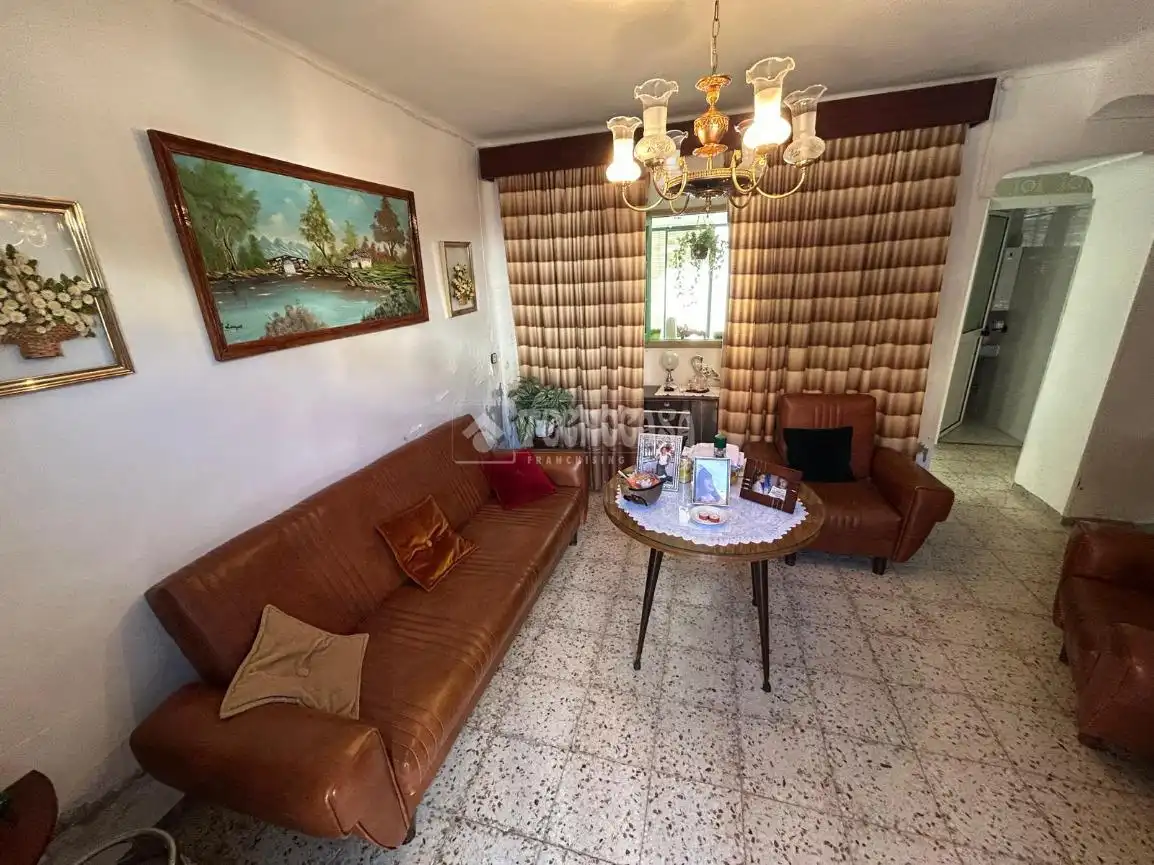 Sala de estar de Casa adosada en venta en Antequera con Terraza