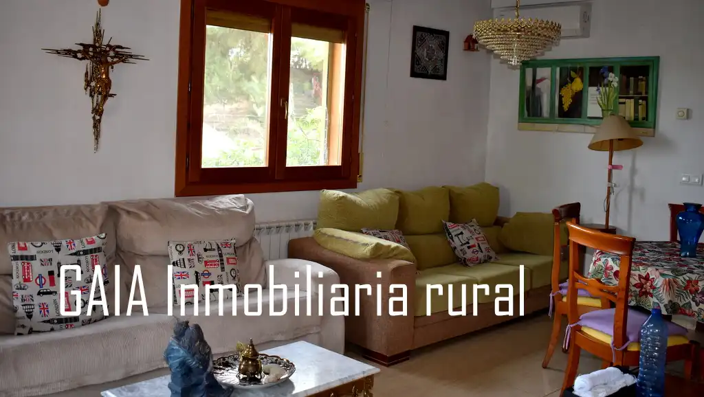 Wohnzimmer von Einfamilien-Reihenhaus zum Verkauf in Caspe
