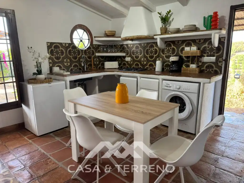 Cuina de Casa o xalet en venda en Vélez-Málaga amb Aire condicionat, Jardí privat i Terrassa