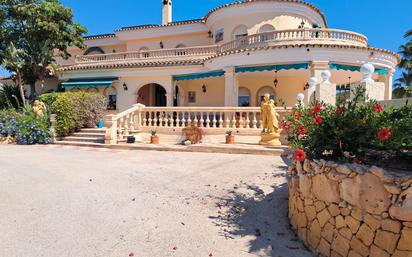 Exterior view of House or chalet for sale in L'Alfàs del Pi  with Air Conditioner, Heating and Private garden