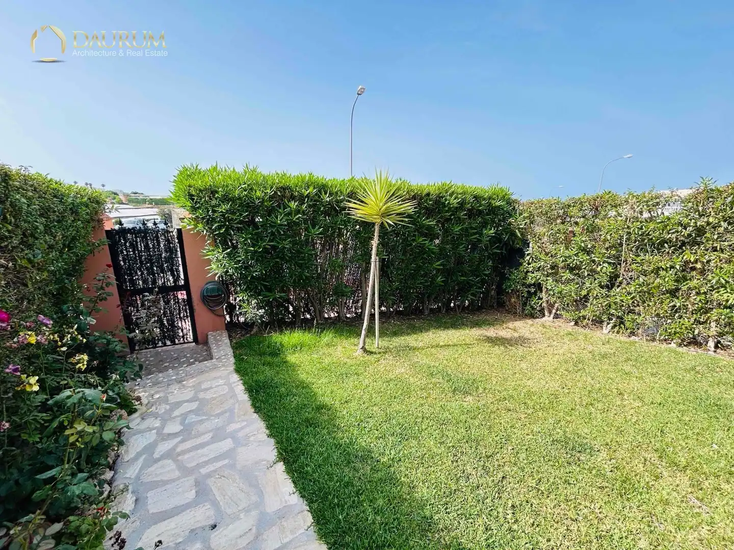 Garten von Einfamilien-Reihenhaus zum Verkauf in Torrox mit Klimaanlage, Heizung und Privatgarten