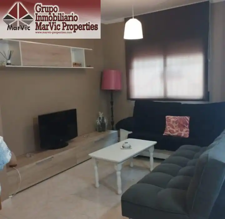 Sala de estar de Apartamento en venta en Benidorm con Jardín privado, Amueblado y Piscina comunitaria