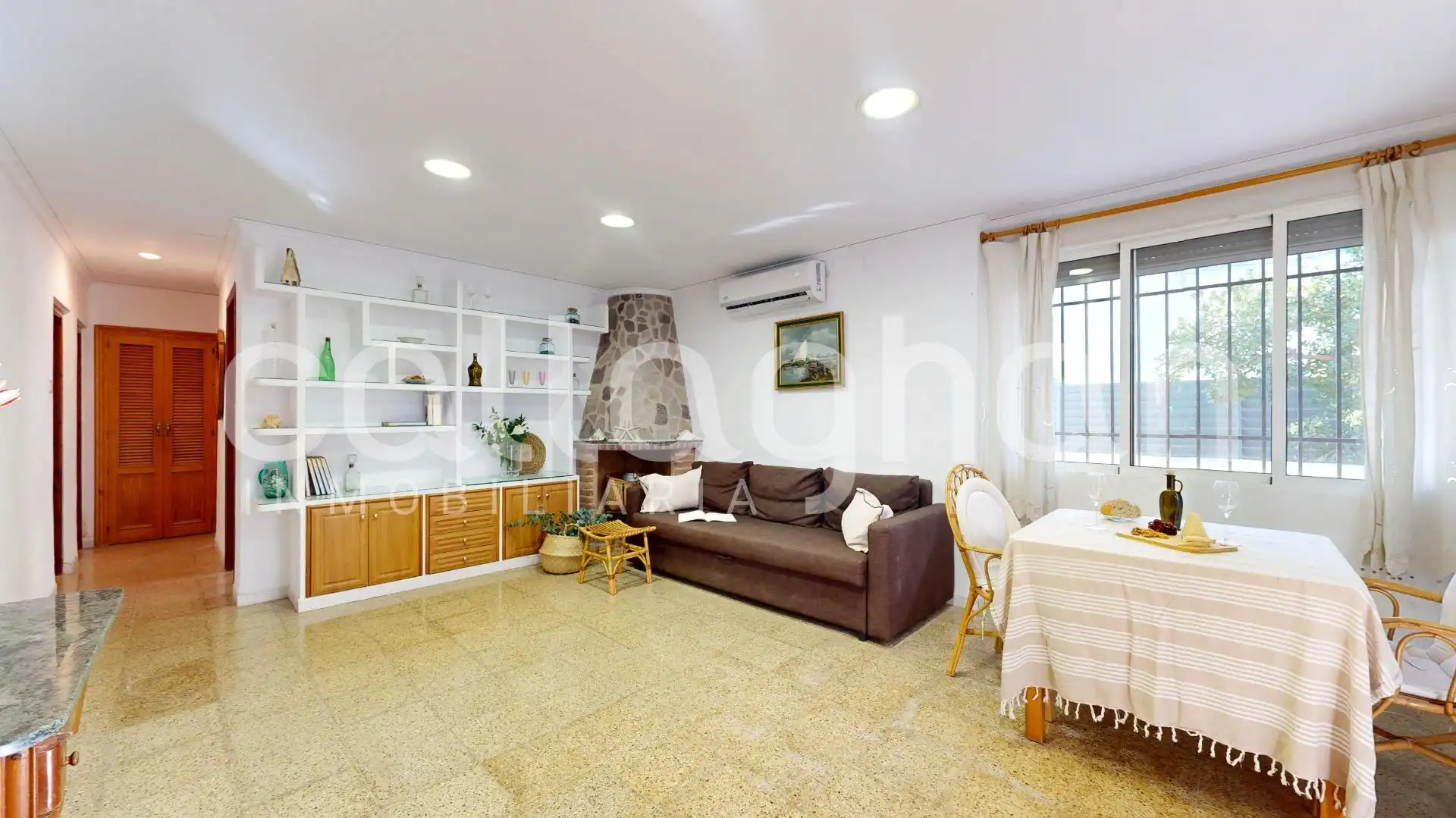 Sala d'estar de Casa o xalet en venda en Sagunto / Sagunt amb Aire condicionat, Calefacció i Jardí privat