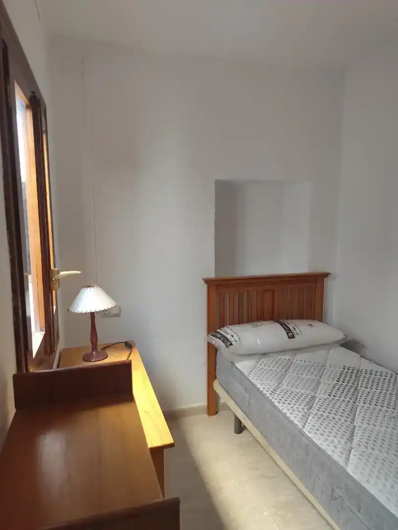 Dormitori de Casa adosada de lloguer en Almería amb Aire condicionat, Rentadora i Microones