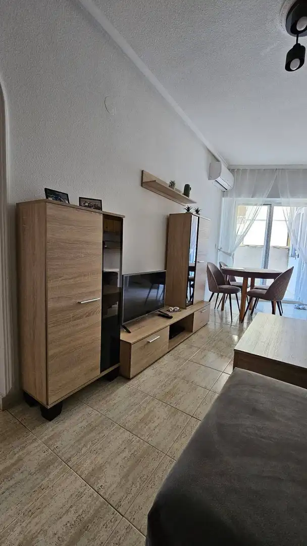 Sala de estar de Ático en venta en Torrevieja con Aire acondicionado, Jardín privado y Piscina