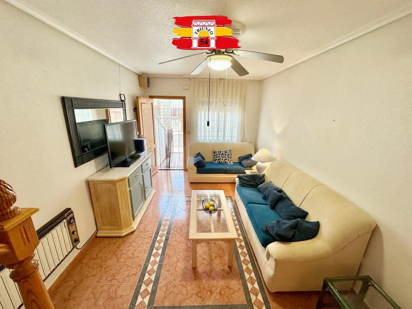 Sala de estar de Casa adosada en venta en Pilar de la Horadada con Aire acondicionado, Terraza y Amueblado