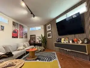 Sala d'estar de Casa o xalet en venda en Gines amb Jardí privat i Moblat