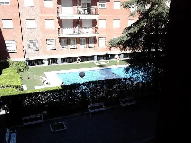 Piscina de Pis de lloguer en Sevilla amb Aire condicionat, Moblat i Piscina comunitària