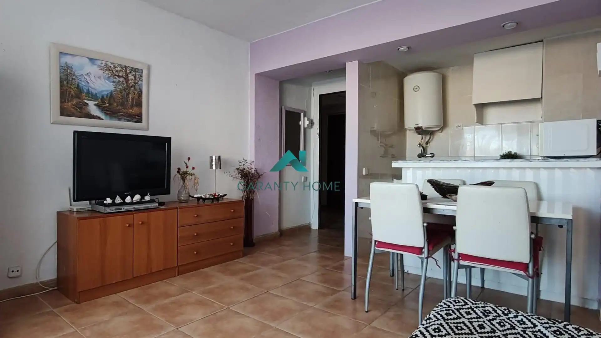 Sala de estar de Apartamento en venta en La Manga del Mar Menor con Amueblado, Balcón y Piscina comunitaria