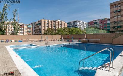 Swimming pool of Flat for sale in  Granada Capital  with Heating, Private garden and Storage room