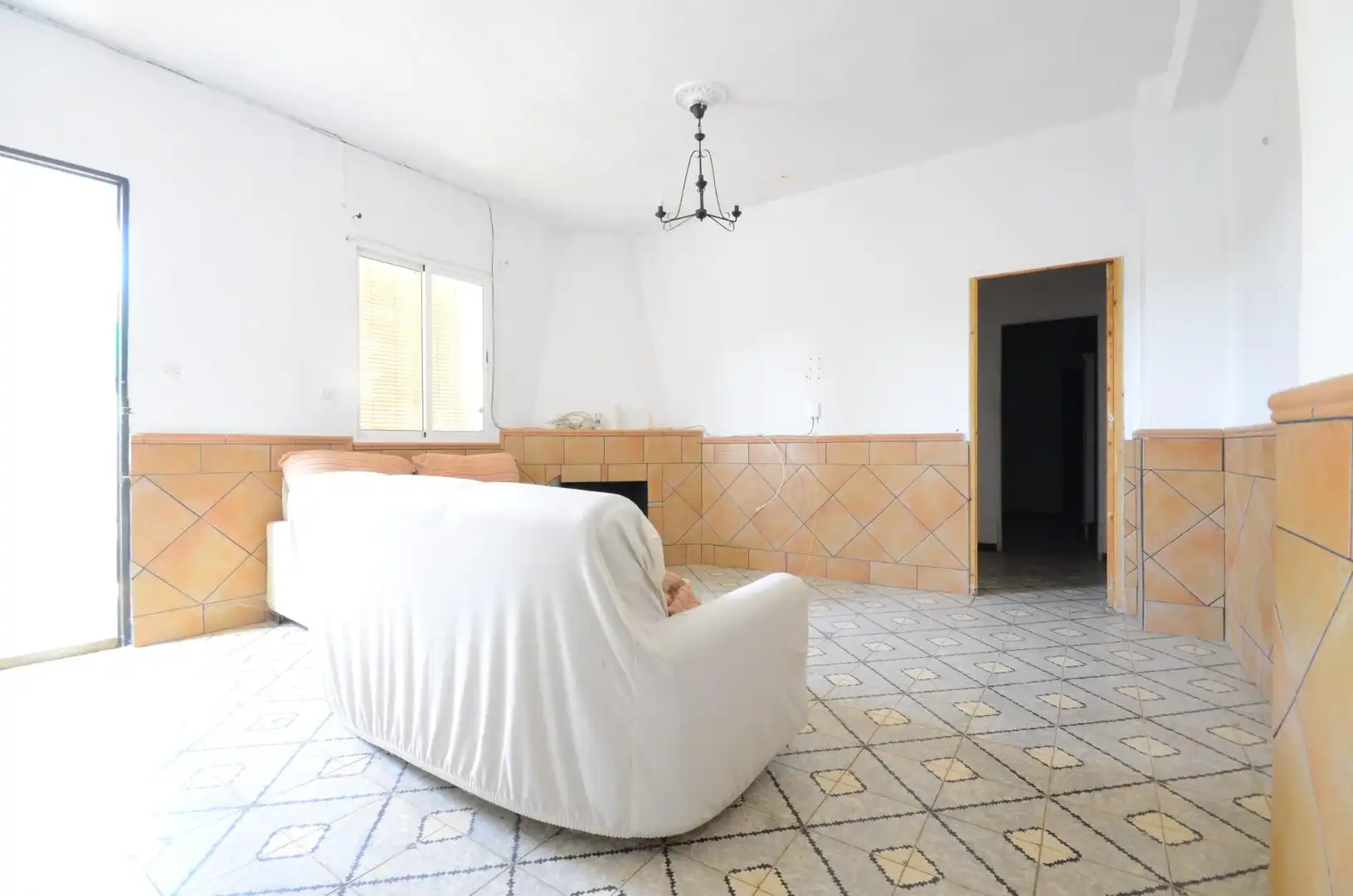 Sala de estar de Casa adosada en venta en Niebla