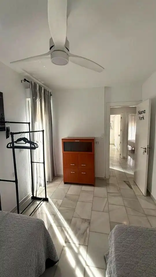 Habitación de Casa adosada en venta en Málaga con Aire acondicionado y Piscina comunitaria