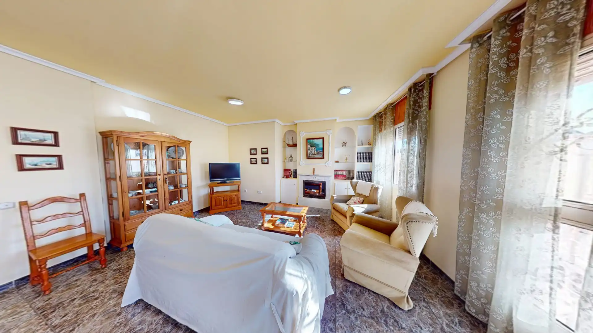 Sala de estar de Casa adosada en venta en Almería con Terraza, Amueblado y Horno