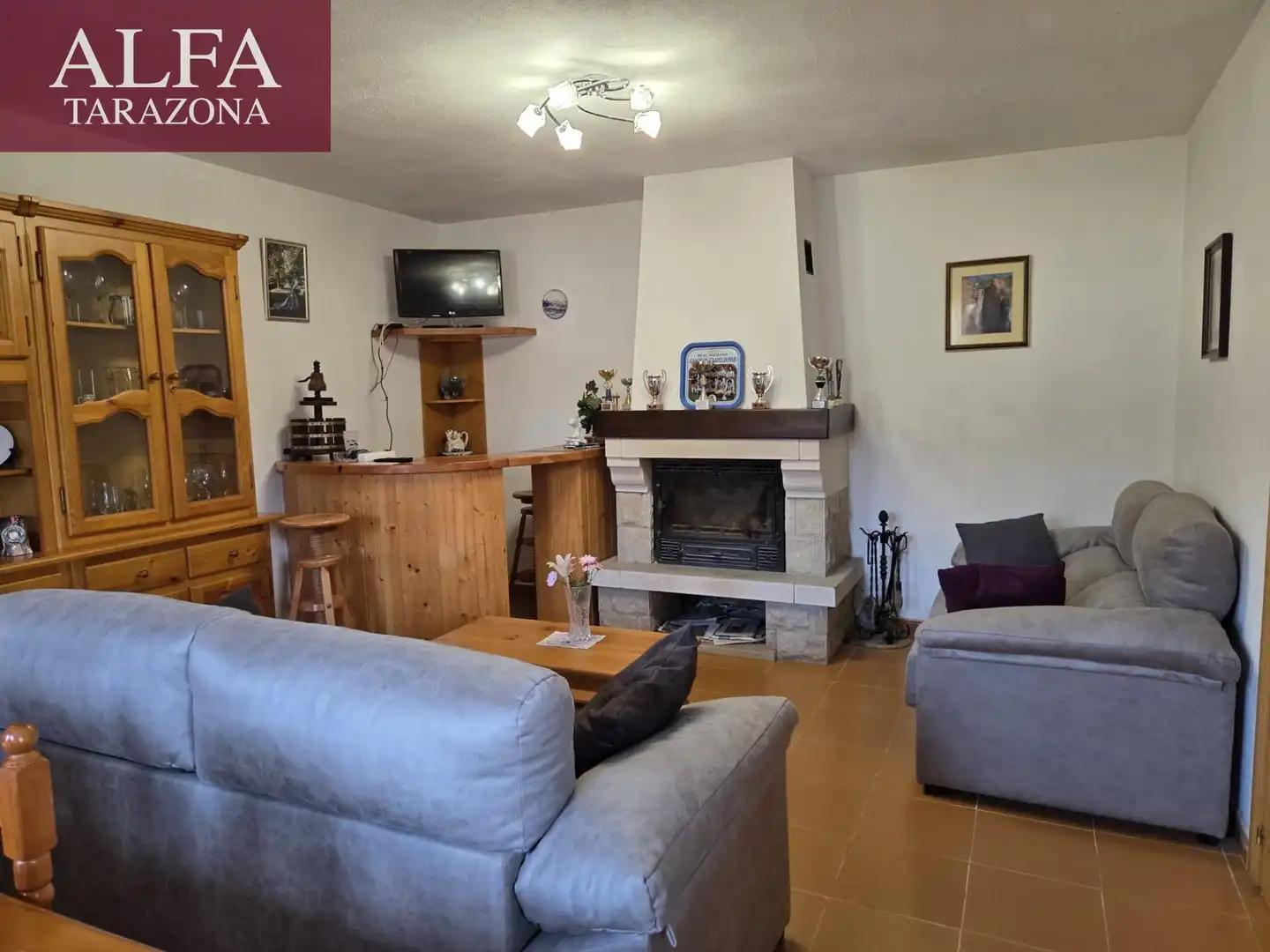 Wohnzimmer von Einfamilien-Reihenhaus zum Verkauf in Añón de Moncayo mit Privatgarten, Terrasse und Gemeinschaftspool